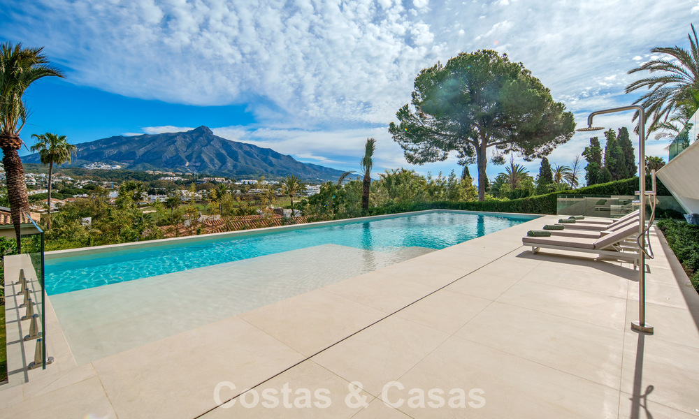 Hedendaagse design villa met panoramisch uitzicht te koop in Nueva Andalucia’s golfvallei, Marbella 800171