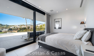 Gesofisticeerde luxevilla te koop met panoramisch uitzicht in Nueva Andalucia’s begeerde golfvallei, Marbella 800327 
