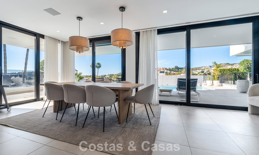 Gesofisticeerde luxevilla te koop met panoramisch uitzicht in Nueva Andalucia’s begeerde golfvallei, Marbella 800329