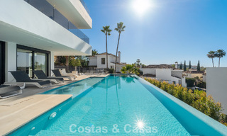 Gesofisticeerde luxevilla te koop met panoramisch uitzicht in Nueva Andalucia’s begeerde golfvallei, Marbella 800339 