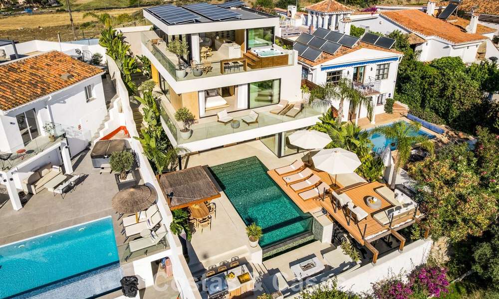 Modern, gerenoveerd luxevilla met prachtig uitzicht te koop in Nueva Andalucia, Marbella 800361