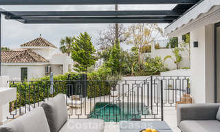 Luxueus, eigentijds gerenoveerd villa te koop in een gated community in Nueva Andalucia’s golfvallei, Marbella 800740 