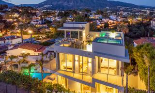 Hedendaagse luxevilla te koop met panoramisch berg- en zeezicht in Nueva Andalucia, Marbella 800899 