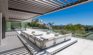 Instapklare, luxueuze, moderne villa te koop, met schitterend uitzicht in La Quinta, een golfurbanisatie in Marbella - Benahavis 801037 