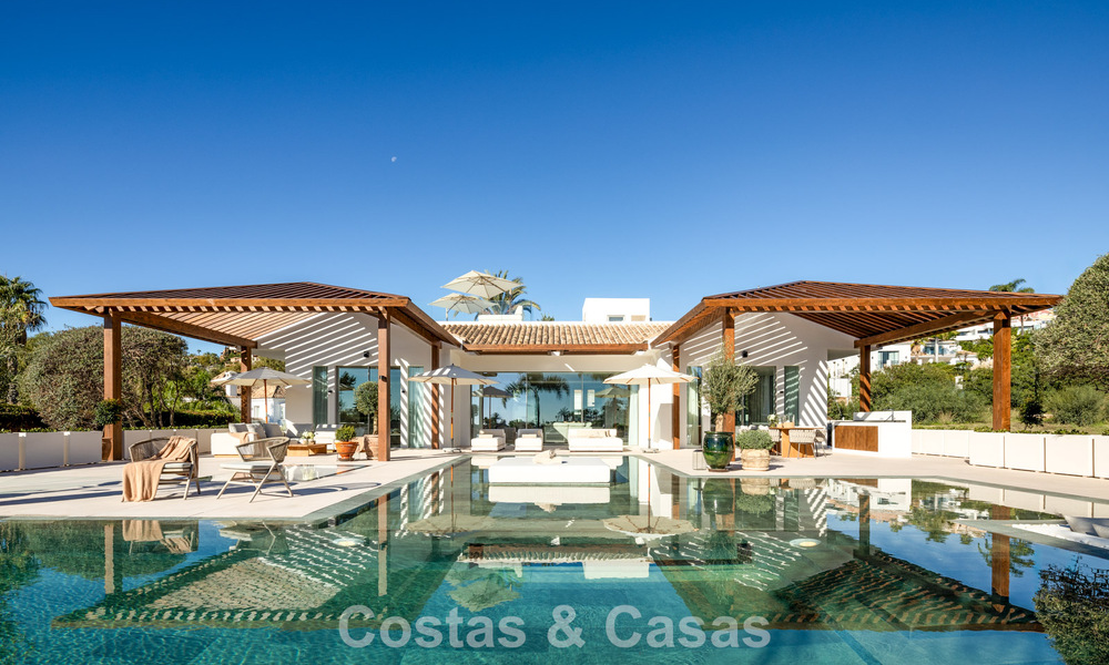 Hedendaagse, mediterrane luxevilla te koop, eerstelijnsgolf in een begeerde golfwijk van Nueva Andalucia, Marbella 801911