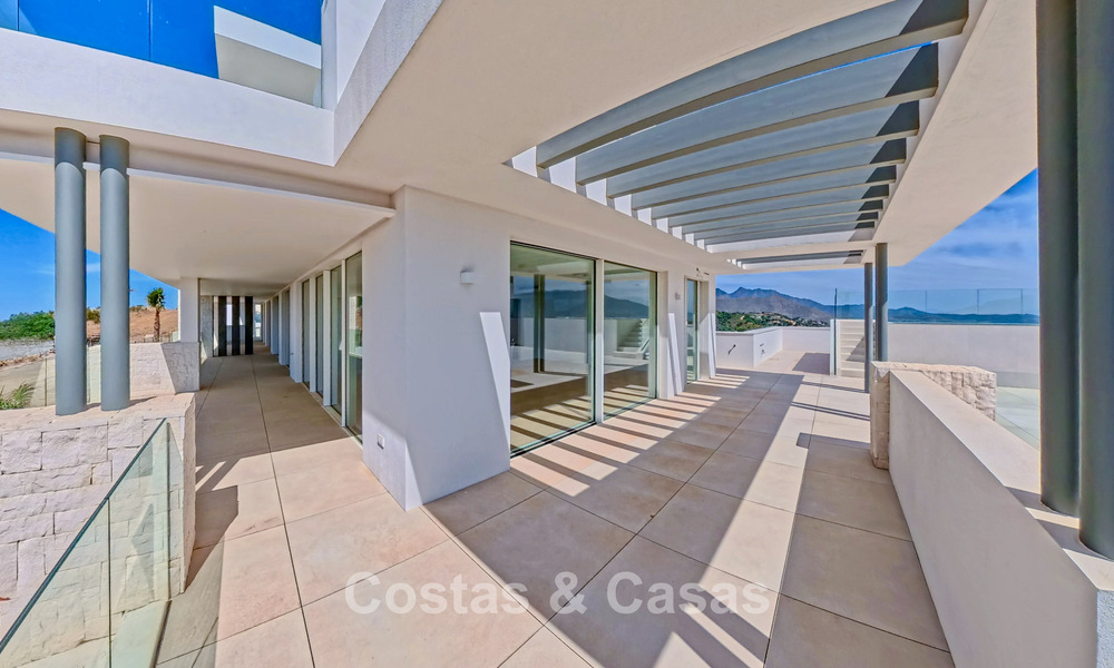 Moderne nieuwbouwappartementen met panoramisch zeezicht te koop nabij Elviria, Marbella Oost 802040
