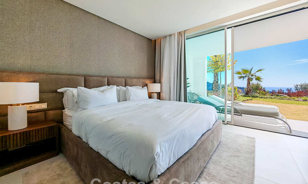 Moderne tuinappartement met zeezicht te koop in een exclusief boetiekcomplex nabij Marbella 802604