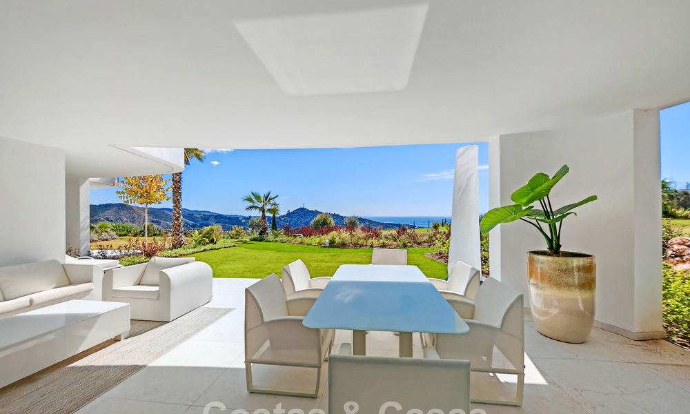 Moderne tuinappartement met zeezicht te koop in een exclusief boetiekcomplex nabij Marbella 802610