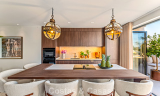 Luxueus gerenoveerd appartement met zeezicht te koop in een gated community op de Golden Mile in Marbella 802836 