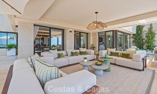 Exclusief, modern duplex penthouse met panoramisch zeezicht te koop in Nueva Andalucia, Marbella 803115 