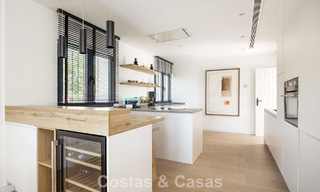 Gelijkvloerse luxevilla met Spaanse bouwstijl en directe toegang tot de golfbaan te koop in Marbella - Benahavis 803512 