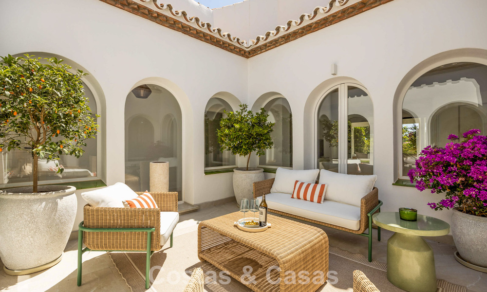 Gelijkvloerse luxevilla met Spaanse bouwstijl en directe toegang tot de golfbaan te koop in Marbella - Benahavis 803522