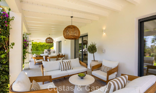 Gelijkvloerse luxevilla met Spaanse bouwstijl en directe toegang tot de golfbaan te koop in Marbella - Benahavis 803531 