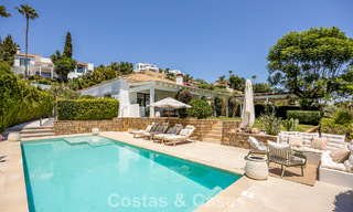 Gelijkvloerse luxevilla met Spaanse bouwstijl en directe toegang tot de golfbaan te koop in Marbella - Benahavis 803532 