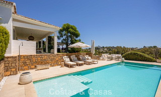 Gelijkvloerse luxevilla met Spaanse bouwstijl en directe toegang tot de golfbaan te koop in Marbella - Benahavis 803533 