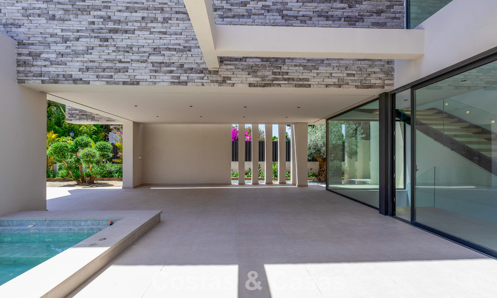 Nieuwe, exclusieve, instapklare, moderne villa te koop in een strandwijk tegen San Pedro, Marbella 803580