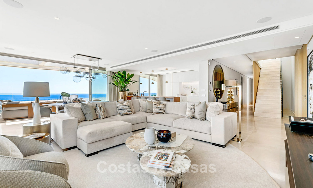 Exclusief modern duplex penthouse met panoramisch zeezicht te koop in Marbella - Benahavis 803779