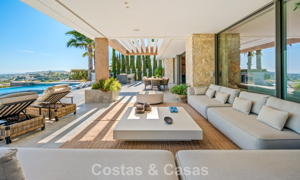 Eersteklas luxevilla met fenomenaal zeezicht te koop, in een afgesloten woonwijk van La Quinta, Marbella - Benahavis 803724