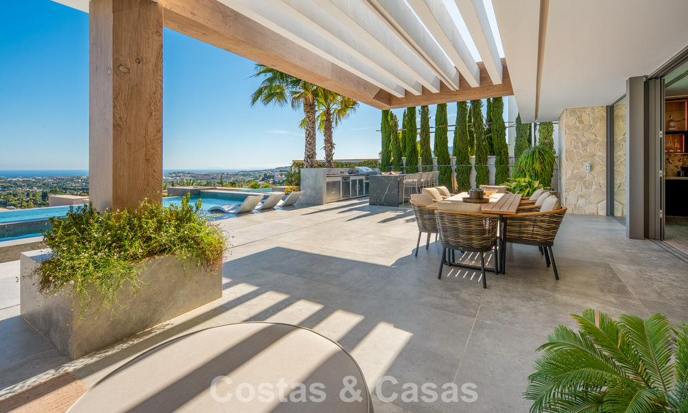 Eersteklas luxevilla met fenomenaal zeezicht te koop, in een afgesloten woonwijk van La Quinta, Marbella - Benahavis 803725