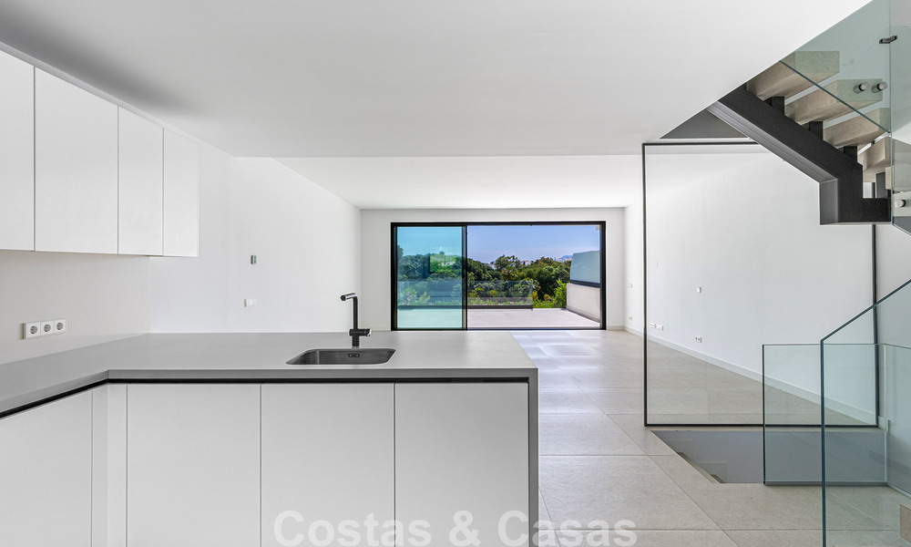 Nieuwe, moderne rijwoning te koop op wandelafstand van het strand in Elviria, ten oosten van Marbella centrum 804087
