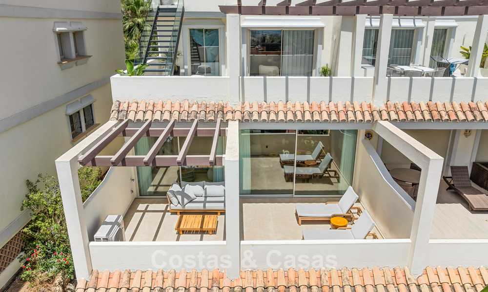 Luxe gerenoveerd appartement met panoramisch uitzicht te koop in Nueva Andalucia, Marbella 804055