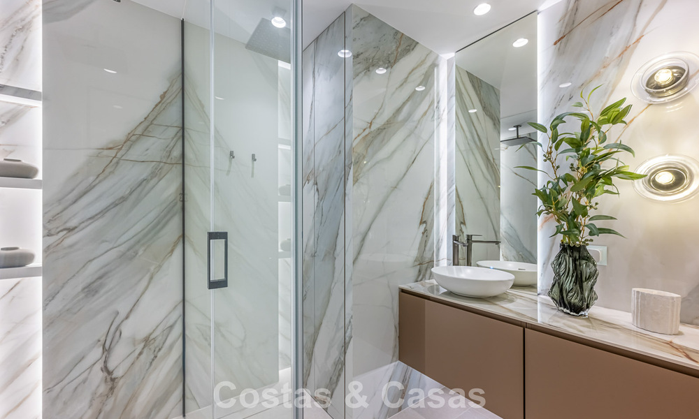 Verfijnd designappartement met zeezicht in een modern strandcomplex op de New Golden Mile, Marbella - Estepona 804710