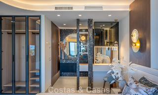 Verfijnd designappartement met zeezicht in een modern strandcomplex op de New Golden Mile, Marbella - Estepona 804716 