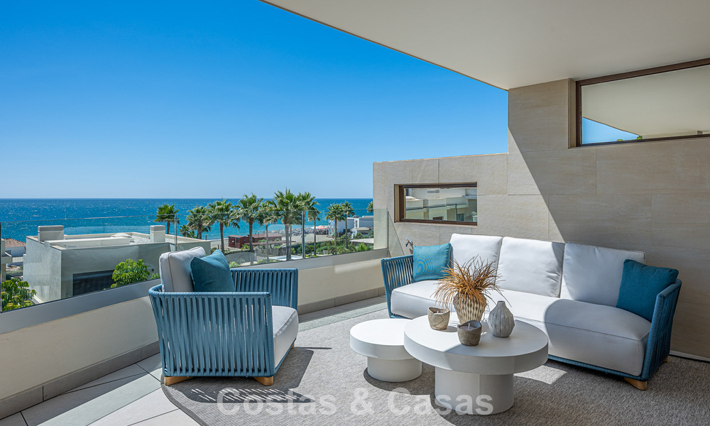 Verfijnd designappartement met zeezicht in een modern strandcomplex op de New Golden Mile, Marbella - Estepona 804719