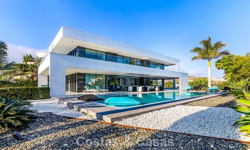 Exclusieve eigentijdse villa met panoramisch zeezicht te koop in Los Flamingos een 5* golfresort in Marbella - Benahavis 804756