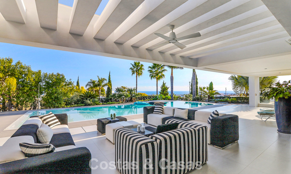 Exclusieve eigentijdse villa met panoramisch zeezicht te koop in Los Flamingos een 5* golfresort in Marbella - Benahavis 804758