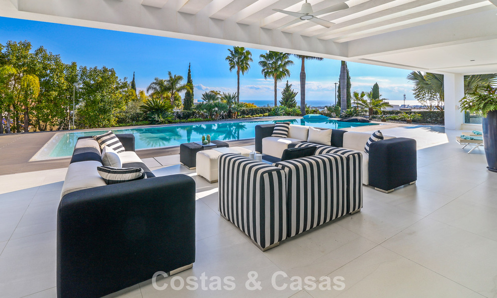 Exclusieve eigentijdse villa met panoramisch zeezicht te koop in Los Flamingos een 5* golfresort in Marbella - Benahavis 804774