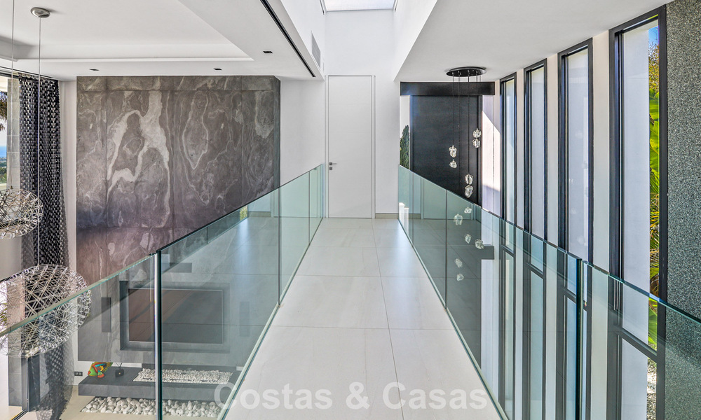 Exclusieve eigentijdse villa met panoramisch zeezicht te koop in Los Flamingos een 5* golfresort in Marbella - Benahavis 804776