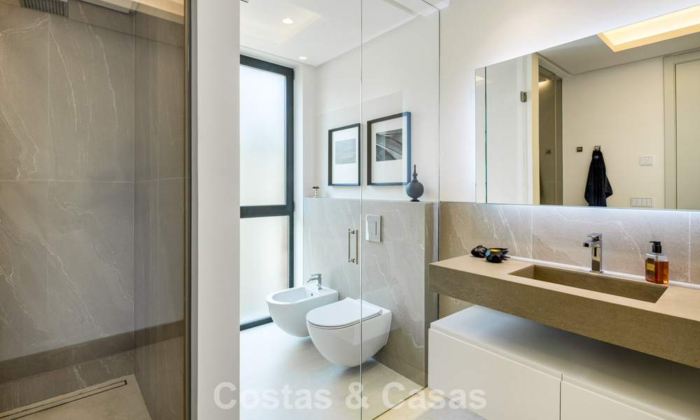 Luxe moderne villa met zeezicht te koop in Nueva Andalucia’s golfvallei, Marbella 806082
