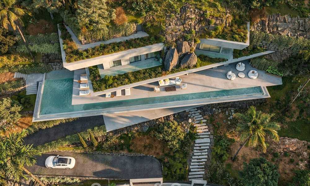 Grensverleggende designvilla met spectaculair zeezicht te koop in een exclusief golfresort in de heuvels van Marbella - Benahavis 806654