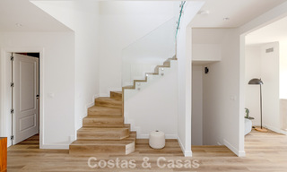 Instapklare, schakelwoningen met Mediterrane bouwstijl te koop direct aan de golfbaan in Estepona 806904 