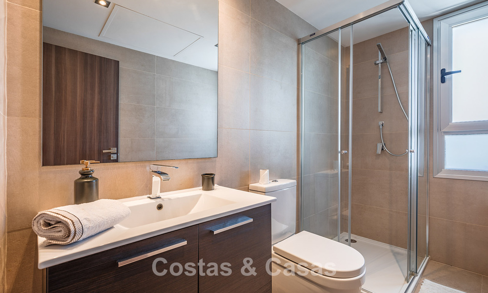 Moderne appartementen te koop in Aqua, een eigentijds complex in San Pedro Playa, Marbella 807140