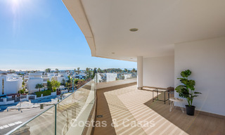 Moderne appartementen te koop in Aqua, een eigentijds complex in San Pedro Playa, Marbella 807150 